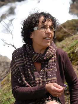 a portrait of mature brunette, outdoors