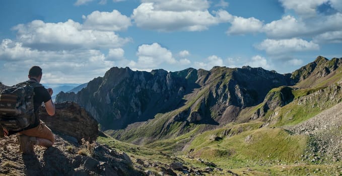 a young man looking Col du tourmalet in the french Pyrenees