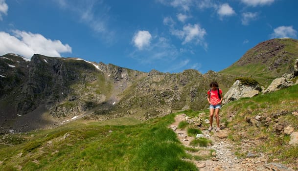 an hiker woman in the french Pyrenees mountains