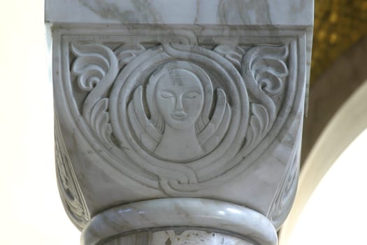 Symbol of Saint Matthew, historic church column ornate detail