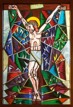 Crucifixion, stained glass window in Memorial Church of the Passion of Jesus in Macelj, Croatia