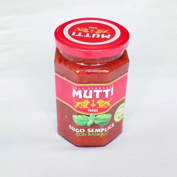 PARMA, ITALY - CIRCA AUGUST 2020: Jar of Mutti tomato sauce with basil