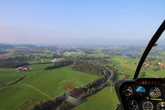A helicopter flight over the Allgaeu in the direction of the city of Kempten (Bavaria)