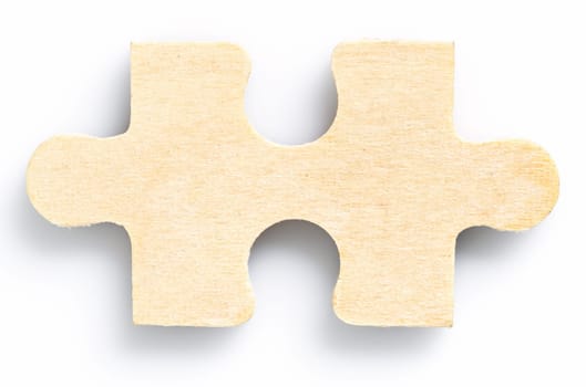 Close up shot of one wood jigsaw puzzel on white background,business concept