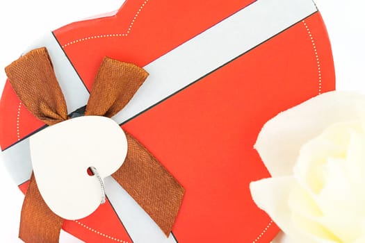 Close up red white and heart-shaped box ,Valentine's Day concept with roses and red heart-shaped box