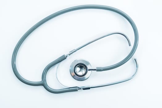 Stethoscope for doctor checkup on health medical laboratory table as medical concept