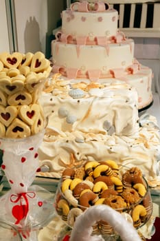Colorful desserts and pastry served on a wedding party
