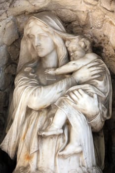 Madonna with Child, detail of a mourning sculpture on a Mirogoj cemetery in Zagreb, Croatia