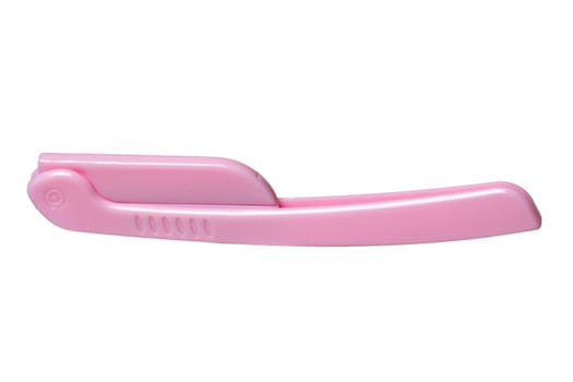 Cosmetic tools. Close-up of a pink eyebrow razor isolated on a white background. Beauty concept. Macro.