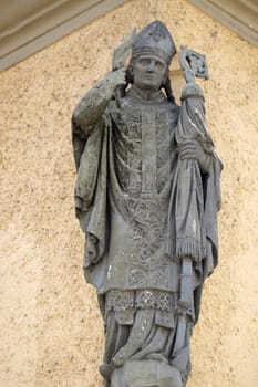 Statue of saint on the house facade in Ptuj, town on the Drava River banks, Lower Styria Region, Slovenia