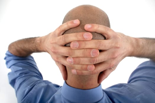 Bald man taking a break from work