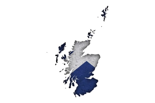 Map and flag of Scotland on weathered concrete