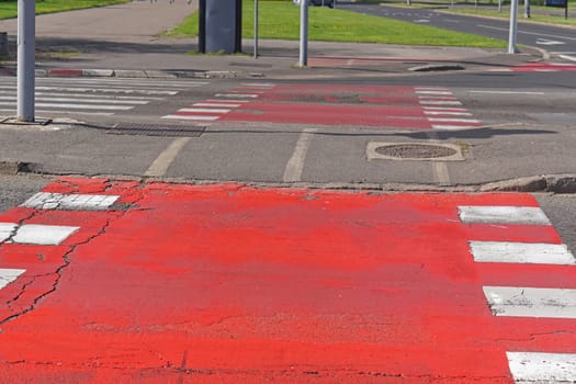 Red paint street crossing for bicycles