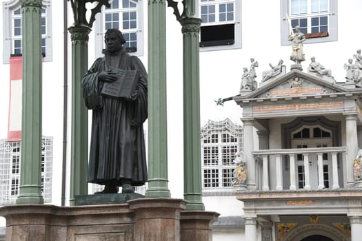 Doctor Martin Luther Monument in Wittenberg,Saxony-Anhalt Germany. In his hand he holds the Luther Bible
