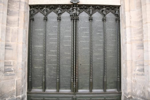Close-up of the 95 disputation theories of Martin Luther at the thesis door of the Schlosskirche in Wittenberg,Germany