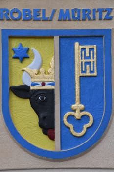 The historical coat of arms of the town of Röbel an der Müritz. It is located at the town hall. The city belongs to the German state of Mecklenburg-Vorpommern in Germany.