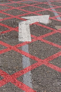 Turn right direction arrow at tarmac