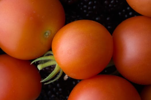 7 - Garden produce, blackberries and tomatoes, make up this full frame food background texture.