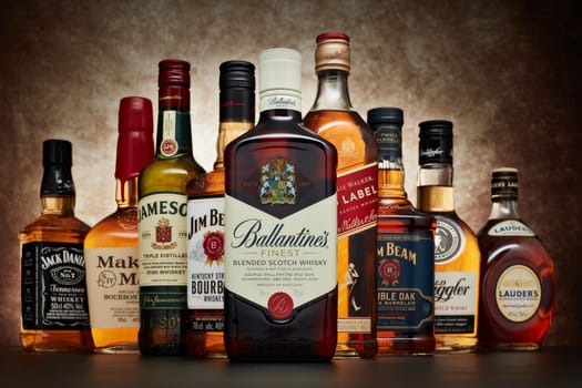 St.Petersburg, Russia - April  2020 - Bottle of Ballantine's Finest blended scotch whisky on background of other popular brands of whiskey (whisky) on dark  background