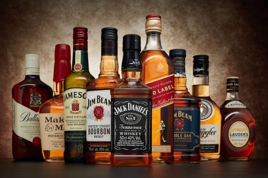 St.Petersburg, Russia - April  2020 - Bottle of  Jack Daniels Jennessee whiskey on background of other popular brands of whiskey (whisky) on dark  background