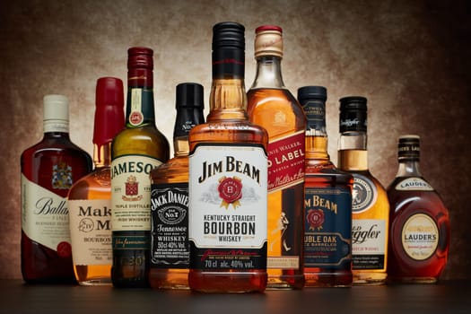 St.Petersburg, Russia - April  2020 - Bottle of Jim Beam bourbon whiskey  on background of other popular brands of whiskey (whisky) on dark  background