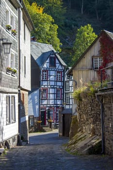 picturesque houses along the Rur River in the historic center of Monschau, Germany