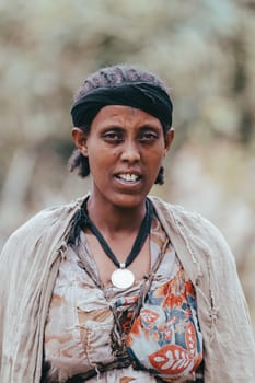 AMHARA REGION, ETHIOPIA, APRIL 22.2019, Midlde age ethiopian shepherdess woman near Gondar city. Amhara region, Ethiopia, April 22. 2019