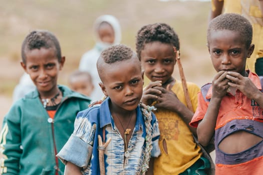 AMHARA REGION, ETHIOPIA, APRIL 22.2019, Group of Ethiopian boys spending free time by the road from Gondar. Amhara Region, Ethiopia, April 22. 2019