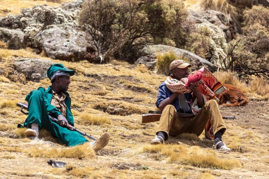 SIMIEN MOUNTAIN, ETHIOPIA, APRIL 24th 2019, Unidentified park scout with his rifle in Chenek - National park Simien Mountain. Working as a guard is one of few possibilities of income for local people. Simien Mountains, Ethiopia, April 24. 2019