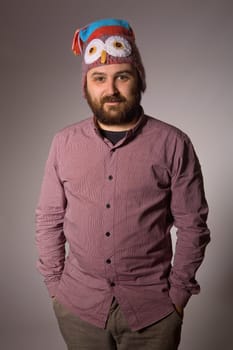 young casual man portrait in a dark background