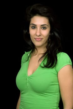 young beautiful brunette portrait against black background