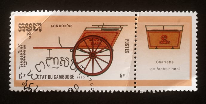 Stamp printed in Cambodia shows Rural post office cart, "Stamp World London 90"" International Stamp Exhibition, circa 1990."