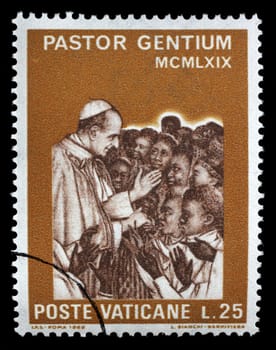Stamp issued in Vatican shows Visit of the Pope Paul VI to Africa, circa 1969.