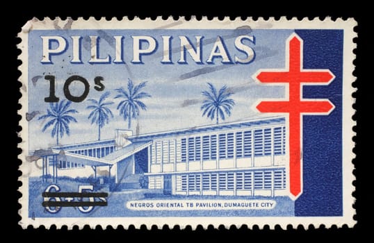 Stamp printed in Philippines, shows Negros Oriental TB Pavilion in Dumaguete city, Fight against Tuberculosis, overprinted in black, circa 1968.