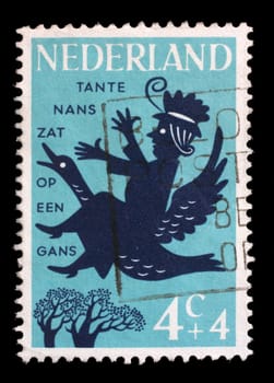 Stamp issued in Iceland shows Aunt Lucy Sat on a Goosey, Nursery Rhymes, circa 1963.