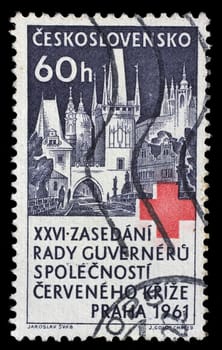 Stamp printed in Czechoslovakia shows Charles Bridge, St. Nicholas Church and Hradcany at Prague, Red Cross, 26th Congress of Boards of Governors, circa 1963
