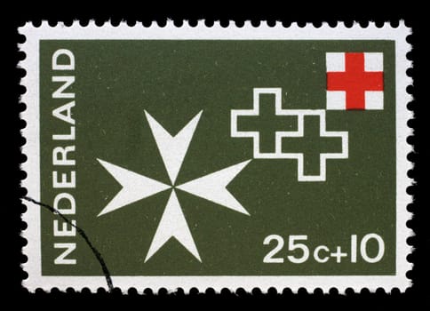 Stamp issued in Netherlands shows Maltese cross, Red Cross series, circa 1967.