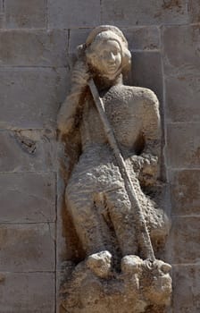 Saint Michael, statue on the portal of Church of the Assumption of the Virgin in Pag, Croatia