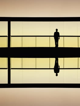 worker inside the modern building in silhouette