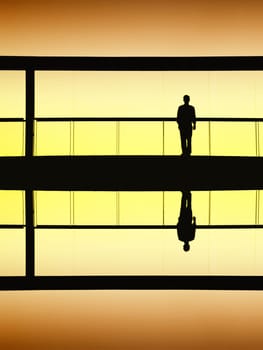 worker inside the modern building in silhouette