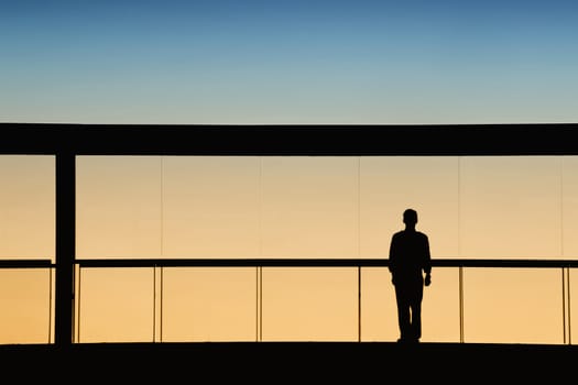 worker inside the modern building in silhouette