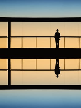 worker inside the modern building in silhouette