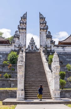 BALI, INDONESIA - SEPTEMBER 17, 2019: Entrance temple of Pura Penataran Agung Lempuyang. In Bali, Indonesia