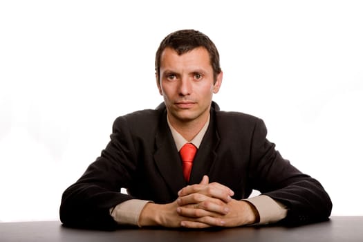 young business man on a desk, isolated on white