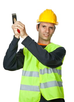 young casual worker portrait with a hammer