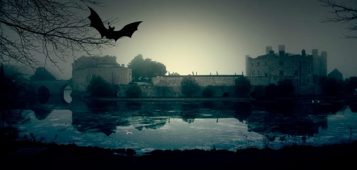 Haunted castle at mysterious, spooky night. Halloween concept.