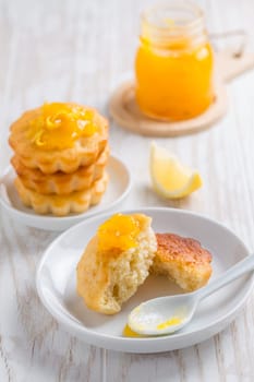 Homemade lemon curd tarts on kitchen table