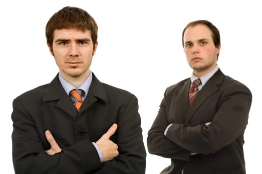 two young business men portrait on white, focus on the left man