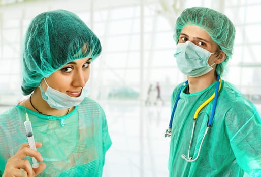 two young doctors, isolated on white background
