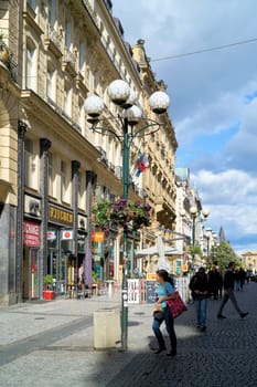 Tourists and residents in a popular shopping street in Prague